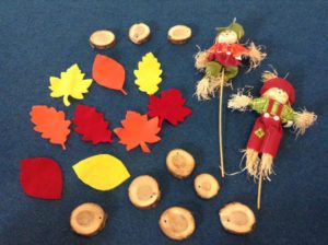More multi-use props - the felt leaves and wood cookies usually used for moving over/on/between and the scarecrows used for holding while on beam or doing other balance skills!